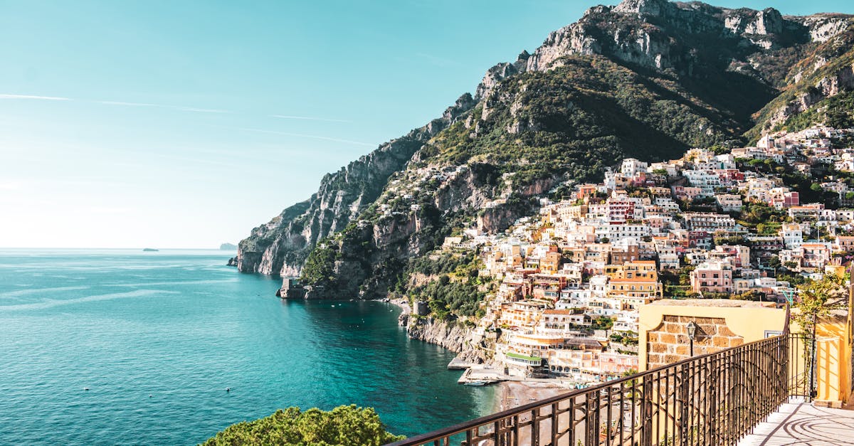 Stunning view of Positano's colorful buildings on the cliffs overlooking the Mediterranean Sea.