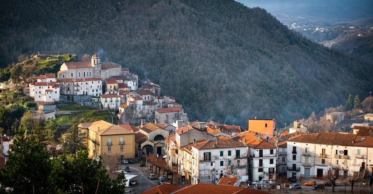 Scenic view of the historic town Pettorano sul Gizio surrounded by lush hills in Italy.