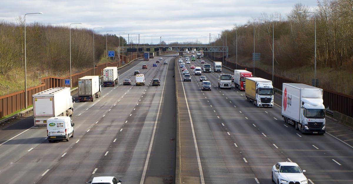 Aerial view of vehicles on a busy motorway in St Albans, UK during daylight.