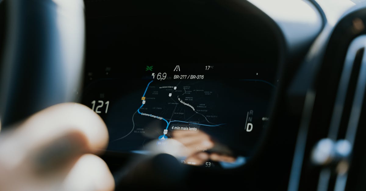 Close-up view of a car dashboard showing a GPS navigation screen in use.