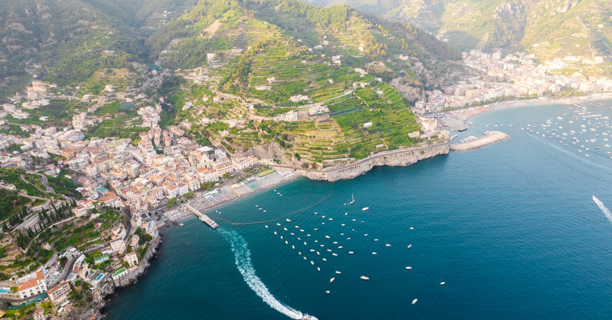 Stunning aerial view of Amalfi coastline, showcasing the vibrant landscape and serene sea.