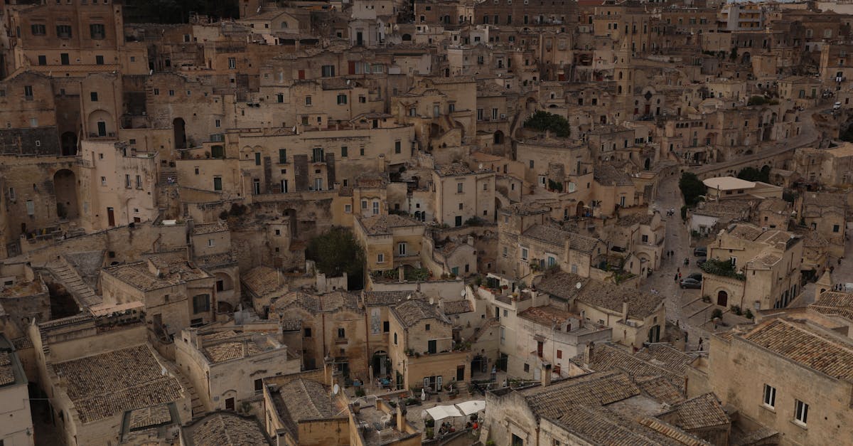 Aerial view of the ancient stone cityscape of Matera, Italy showcasing old urban architecture.