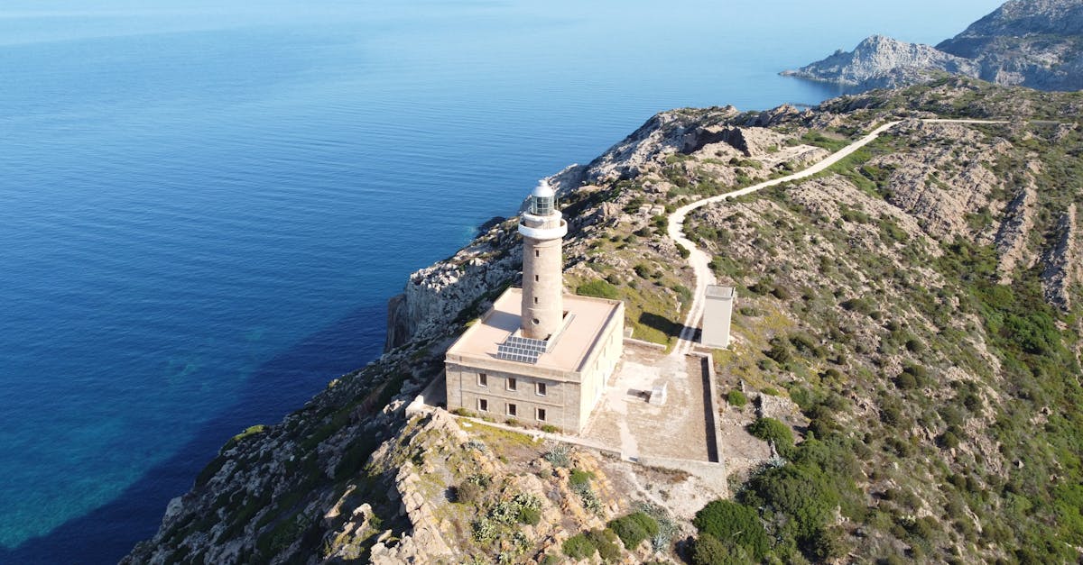 Stunning aerial shot of the Capo Sandalo Lighthouse on San Pietro Island, Sardinia.