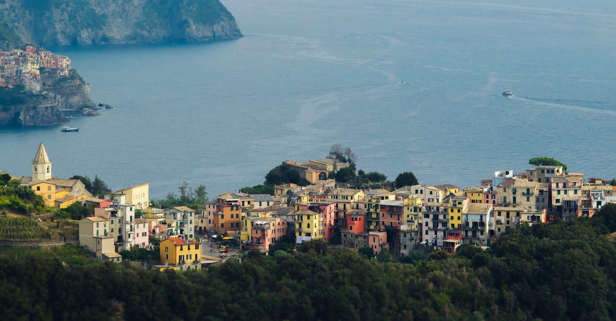 A stunning coastal view of colorful houses in Cinque Terre, Italy, overlooking the sea.