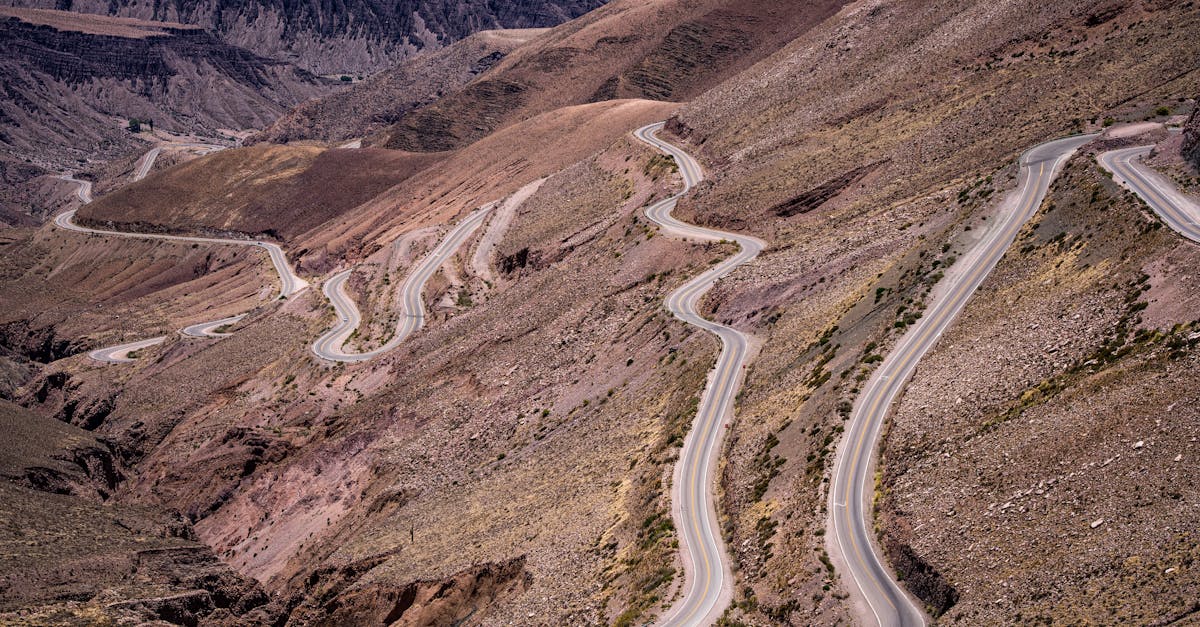 Scenic serpentine road weaving through the Andes Mountains in Argentina.