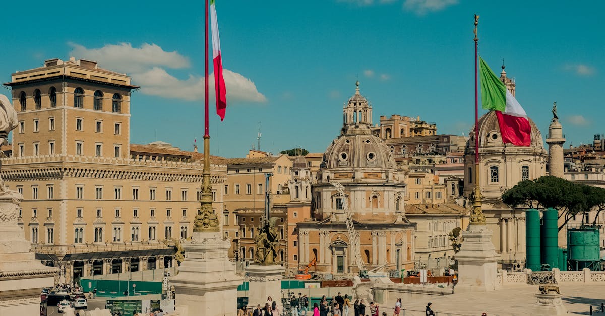 Beautiful view of Piazza Venezia in Rome, featuring historic architecture and lively atmosphere.