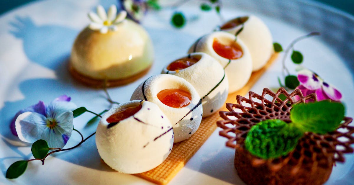 Elegant gourmet dessert with artistic plating and floral accents. Perfect for fine dining themes.
