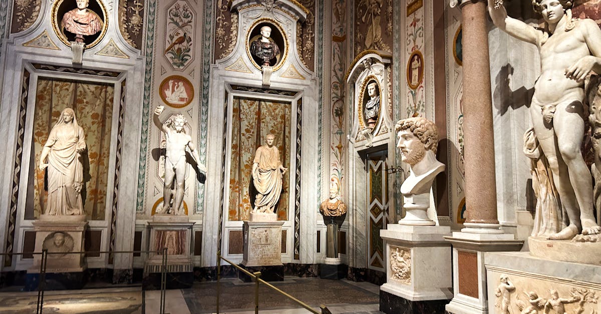 Exquisite ancient Roman sculptures and decor inside Borghese Gallery, Rome, showcasing historic art.