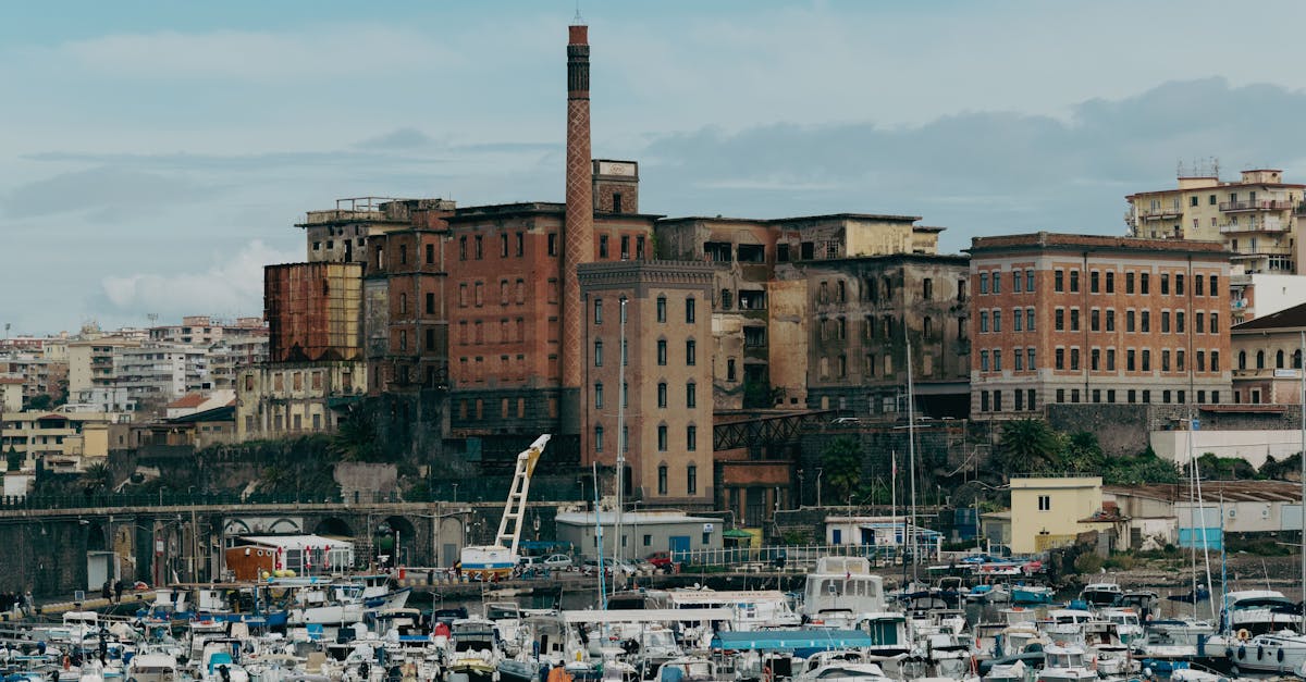 Explore the captivating blend of urban architecture and maritime scenery in Naples, Italy.