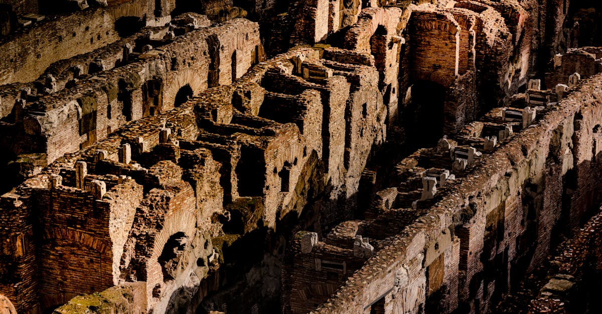 Discover the architectural splendors of ancient Rome in this captivating image of the Colosseum's ruins.