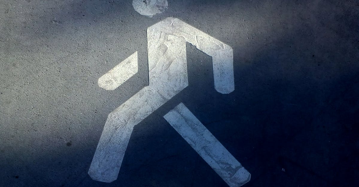 Close-up of pedestrian symbol painted on pavement in Tobolsk.