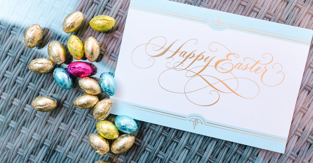 Beautiful Easter card with colorful chocolate eggs on a woven surface.