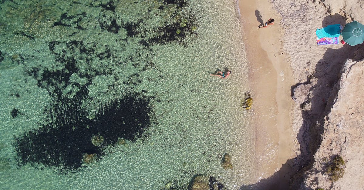 Stunning aerial view of Gallipoli's clear waters and sandy shores, capturing relaxation and natural beauty.